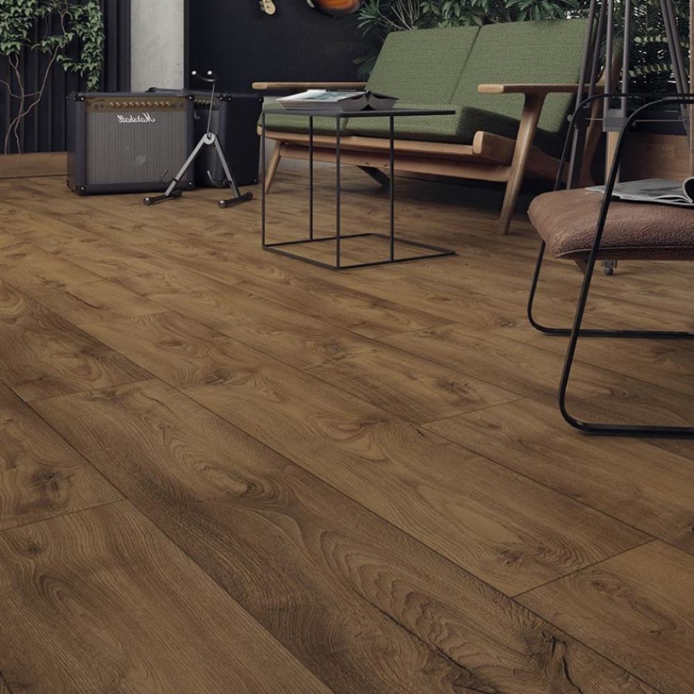 The Estate Oak Laminate Flooring - 12mm features Waterproof, AC6-rated, Express Click installation and a 40-year warranty.