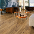 The Everest Oak Bronze Laminate Flooring - 12mm features AC5-rated durability, embossed oak finish and 5G Click installation.