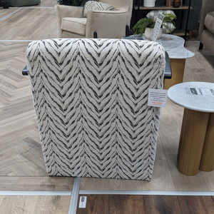 The Falcon Accent Chair features a bold patterned fabric, sleek black wooden arms and deep cushioning for a stylish and comfortable statement to any room