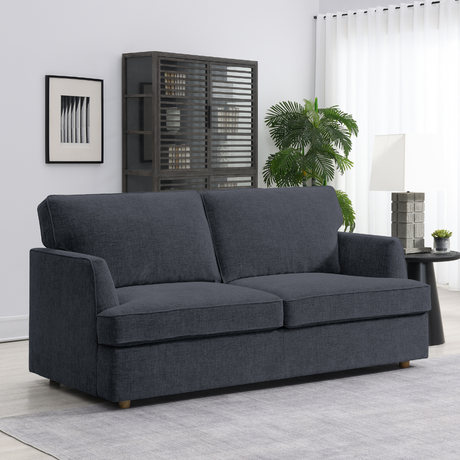 The Felix Sofa Bed in Dark Grey features a hinged drop-back design, easily converting into a double bed along