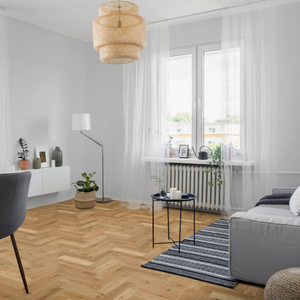 The Natural Oak Brushed Herringbone Engineered Flooring - 15mm features natural brushed oak, durable multi layer core and a stylish herringbone