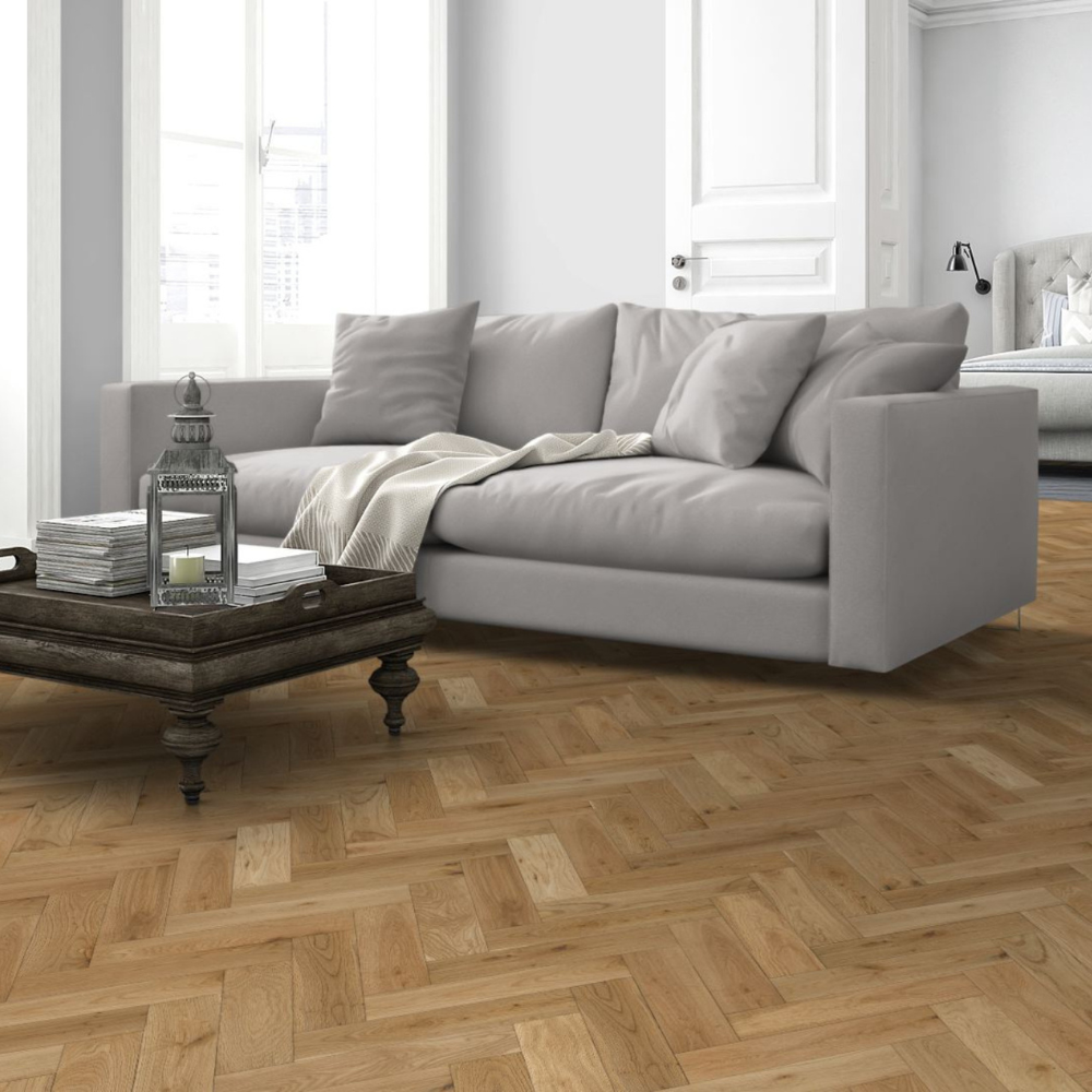 The Natural Oak Brushed Herringbone Engineered Flooring - 15mm features natural brushed oak, durable multi layer core and a stylish herringbone