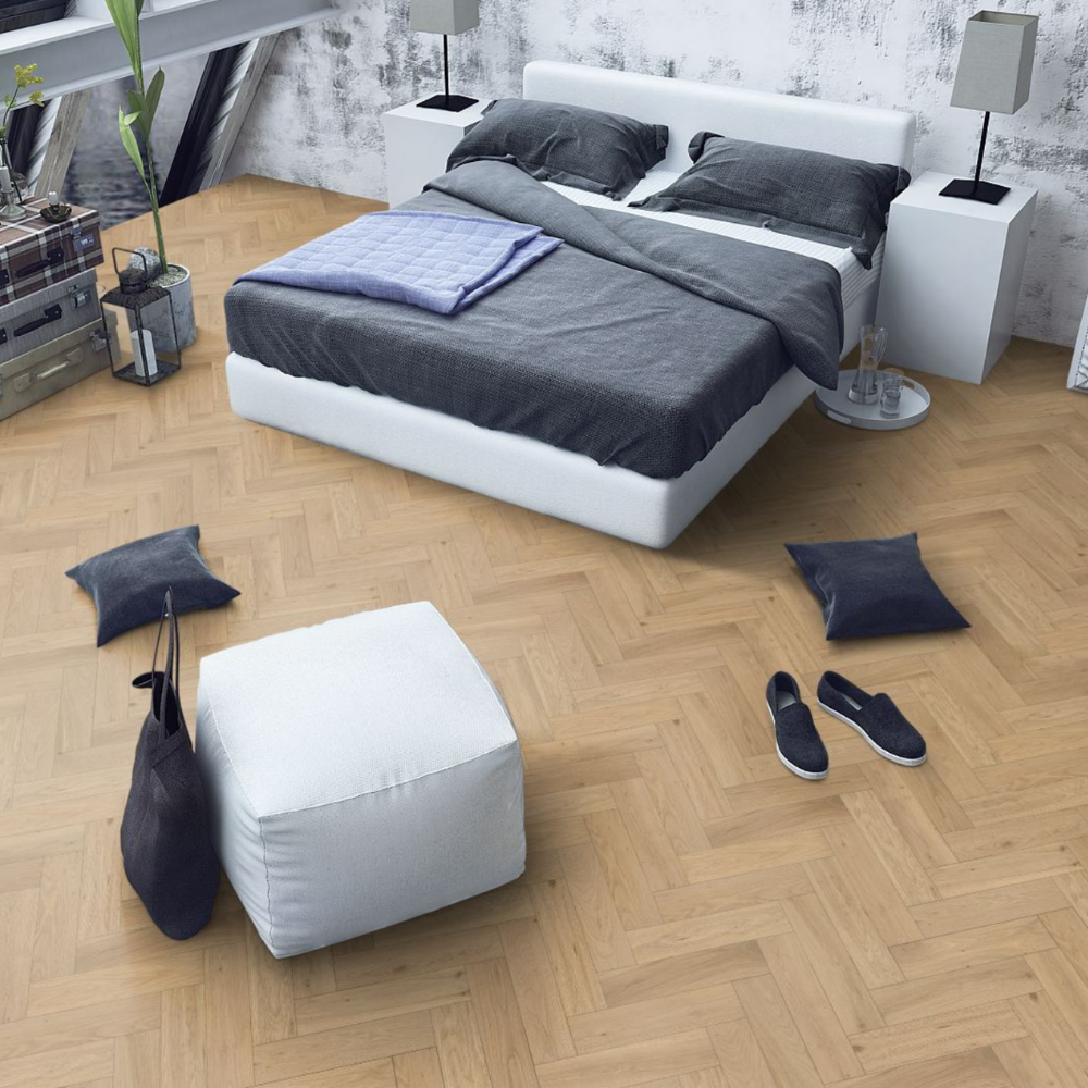 The Whisper Oak Herringbone Engineered Flooring - 15mm features warm oak tones, modern herringbone design and durable multi layer construction