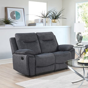 The Edison Recliner Sofa in Grey features easy-clean fabric, electric reclining, drop-down tray with cup holders, wireless charging.