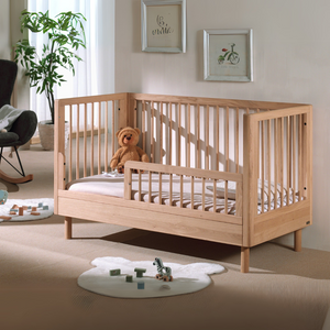 The Forrest Convertible Baby Bed 70 x 140cm in Oak transforms into a toddler bed for extended use & adjustable base with 3 heights, ideal for growing kids