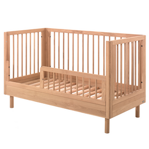 The Forrest Convertible Baby Bed 70 x 140cm in Oak transforms into a toddler bed for extended use & adjustable base with 3 heights, ideal for growing kids