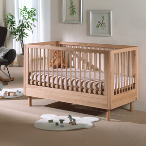 The Forrest Convertible Baby Bed 70 x 140cm in Oak transforms into a toddler bed for extended use & adjustable base with 3 heights, ideal for growing kids