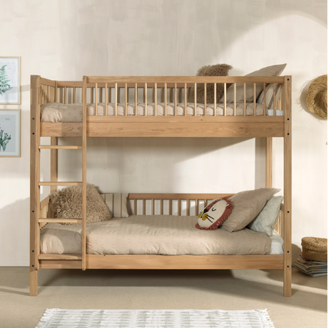 The Forrest Kids Bunk Bed in Oak features a reversible ladder that converts into 2 single beds, a rustic style and durable high quality European oak