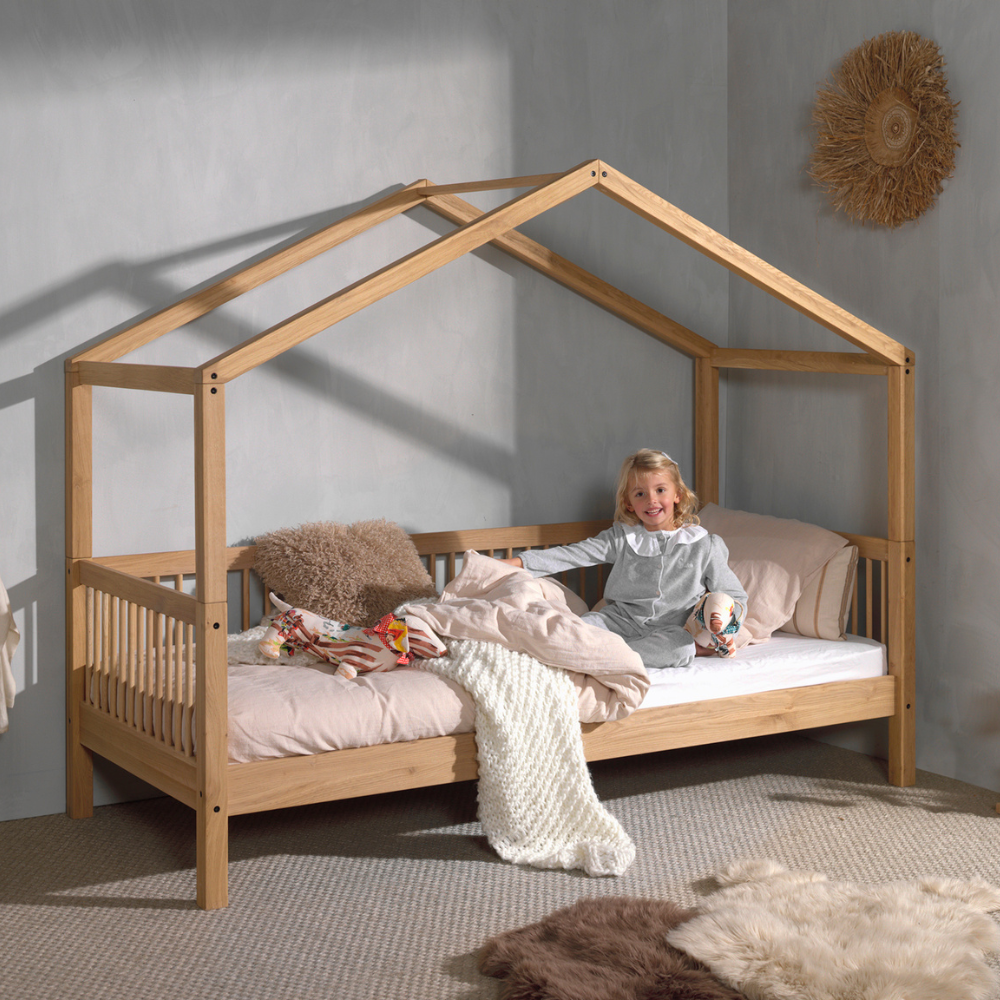 The Forrest Kids House Bed in Oak offers a 3 sided rail, removable roof, a natural lacquered finish in a rustic style and convertible into a cabin bed