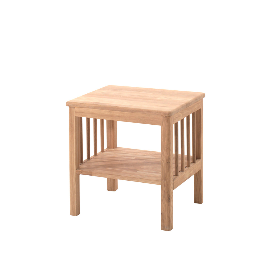 The Forrest Kids Nightstand in Oak features 2 open shelves, crafted from European oak with a warm natural finish, for both durability and style