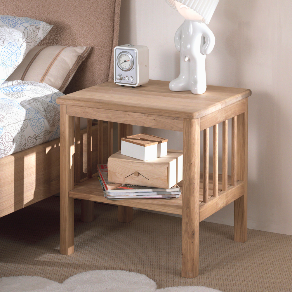 The Forrest Kids Nightstand in Oak features 2 open shelves, crafted from European oak with a warm natural finish, for both durability and style