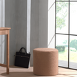 The Forrest Kids Pouf in Brown features multifunctional design use as a seat, footstool or nightstand, in warm brown soft bouclé perfect for modern rooms