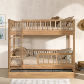 The Forrest Oak Kids Bunk Bed with Drawer & Safety Rail offers strong oak material, a drawer for ample storage space and a safety rail for added protection
