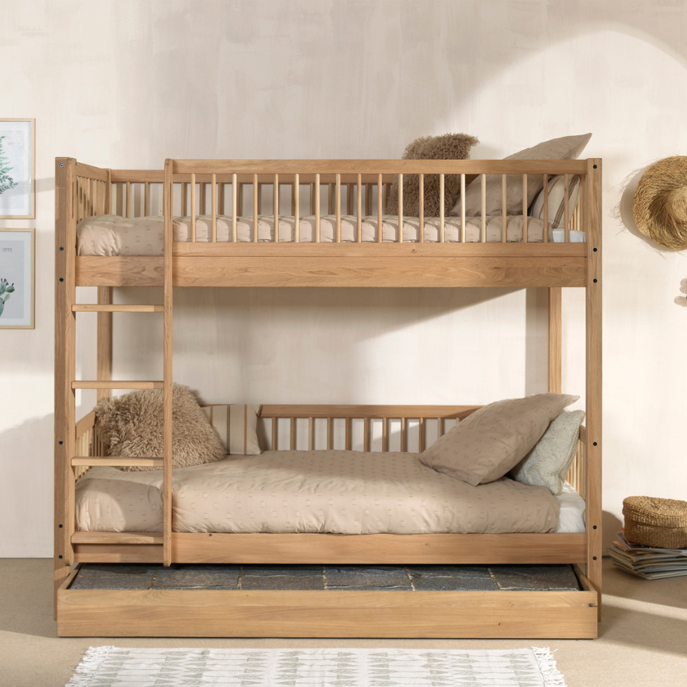 The Forrest Oak Kids Bunk Bed with Drawer provides strong oak material while providing ample storage space and ladder that can be positioned on either side