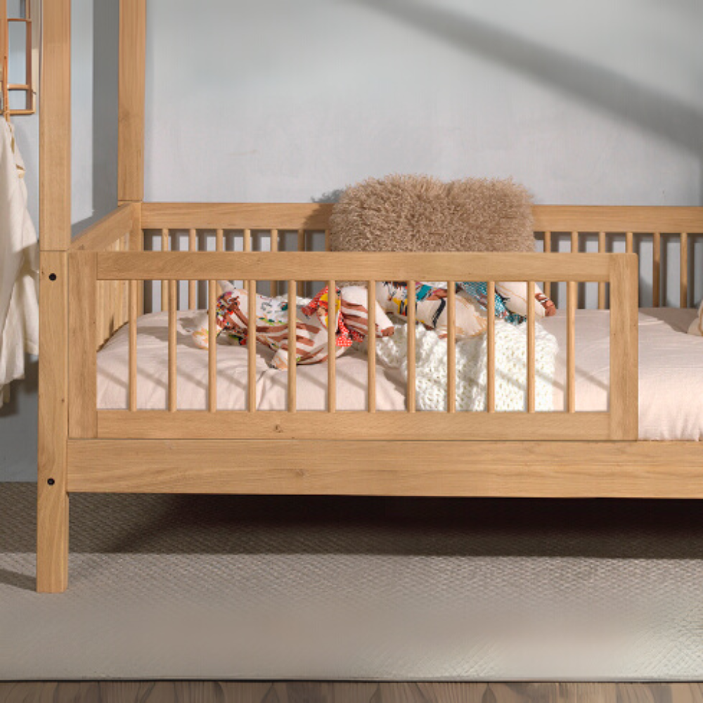 The Forrest Oak Kids Cabin Bed with Drawer & Safety Rail features a drawer for extra storage space and safety rail for added fall protection
