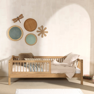 The Forrest Oak Kids Cabin Bed with Safety Rail features a safety rail for added protection and a natural finish with strong oak material