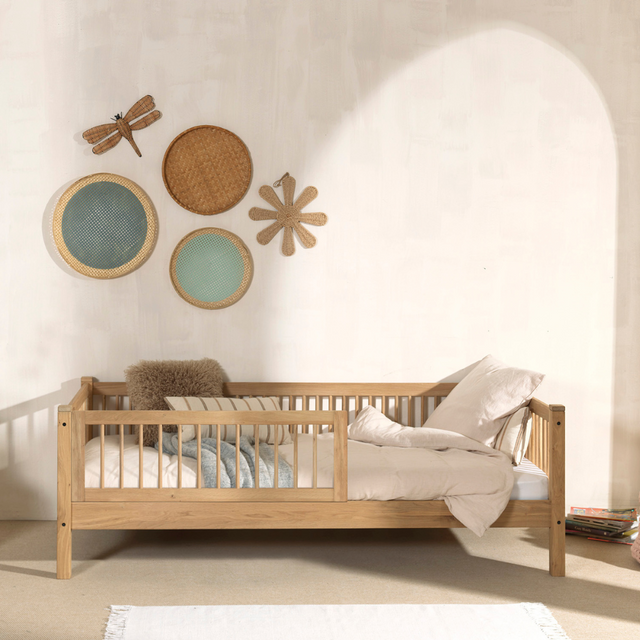 The Forrest Oak Kids Cabin Bed with Safety Rail features a safety rail for added protection and a natural finish with strong oak material