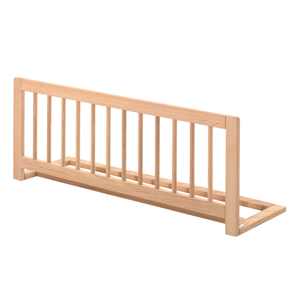 The Forrest Oak Kids Cabin Bed with Safety Rail features a safety rail for added protection and a natural finish with strong oak material