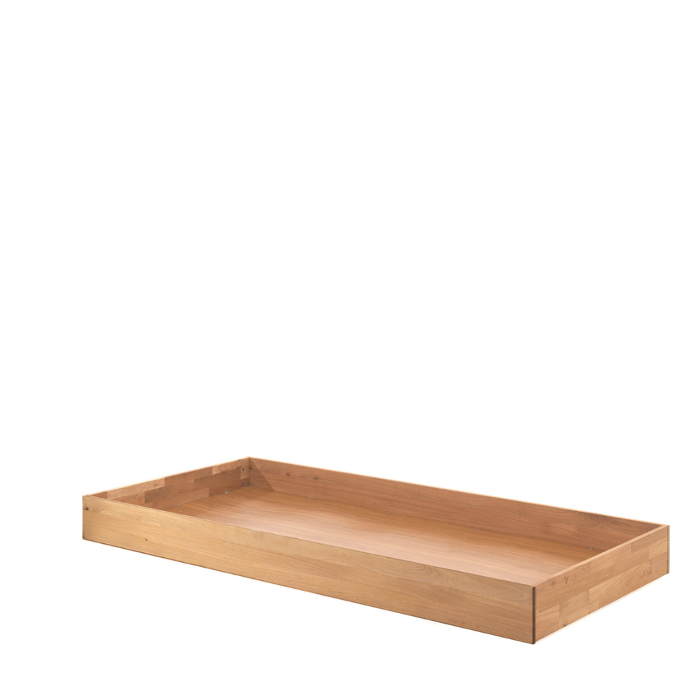 The Forrest Oak Kids Cabin Bed with Trundle features a pull out trundle for extra storage space and durable oak material with a natural lacquered finish