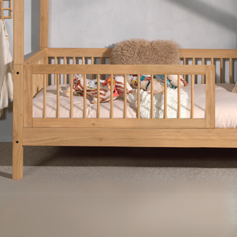 The Forrest Oak Kids House Bed Set features a drawer, safety rail & textile set, 4 side guardrail & an underbed drawer for storage, ideal for kids aged 4+