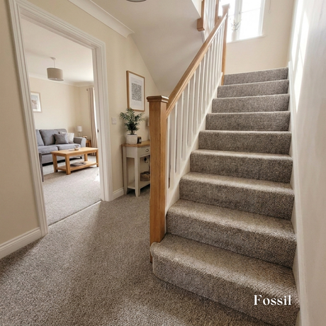 Fossil colour carpeted staircase with a view into a living room