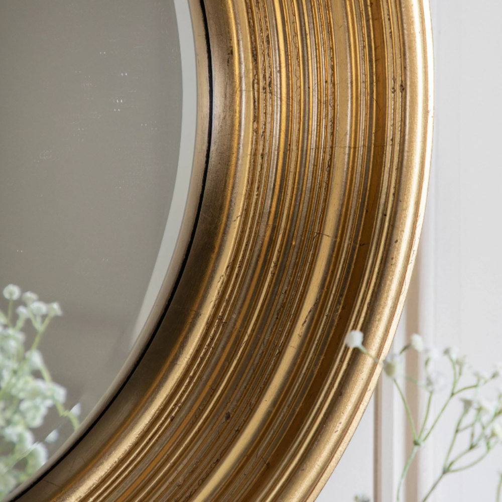 Add luxury to any room with the Gallery Chaplin Round Mirror in Gold. Elegant finish, round design, and high-quality glass.