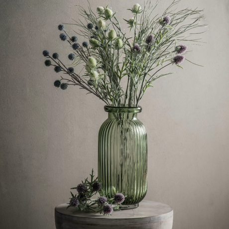 The Gallery Francia Large Vase in Green offers a ribbed texture and stylish shape, adding elegance and beauty to any room.
