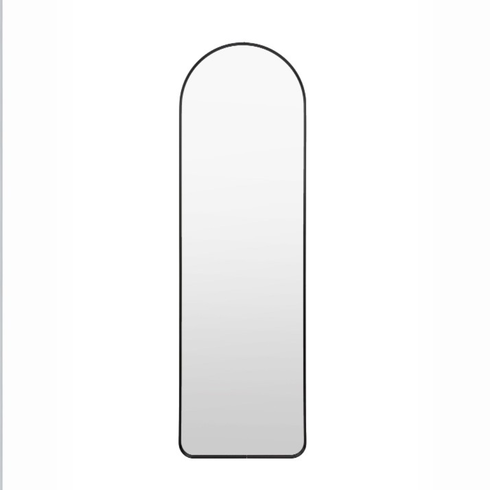 Elevate any room with the Gallery Holworth Arch Mirror in Black featuring a black frame, elegant arch design & versatile style