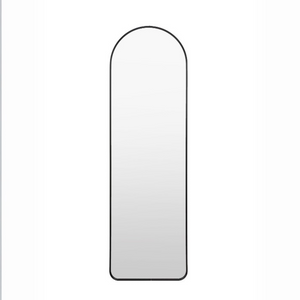 Elevate any room with the Gallery Holworth Arch Mirror in Black featuring a black frame, elegant arch design & versatile style