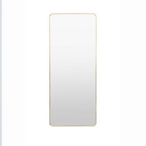 The Gallery Holworth Leaner Mirror - Gold offers full-length mirror with sleek gold frame, adding elegance and space to any room