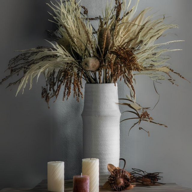 The Gallery Larson Medium Vase in White offers a matte finish, ideal for displaying flowers or an accent piece.