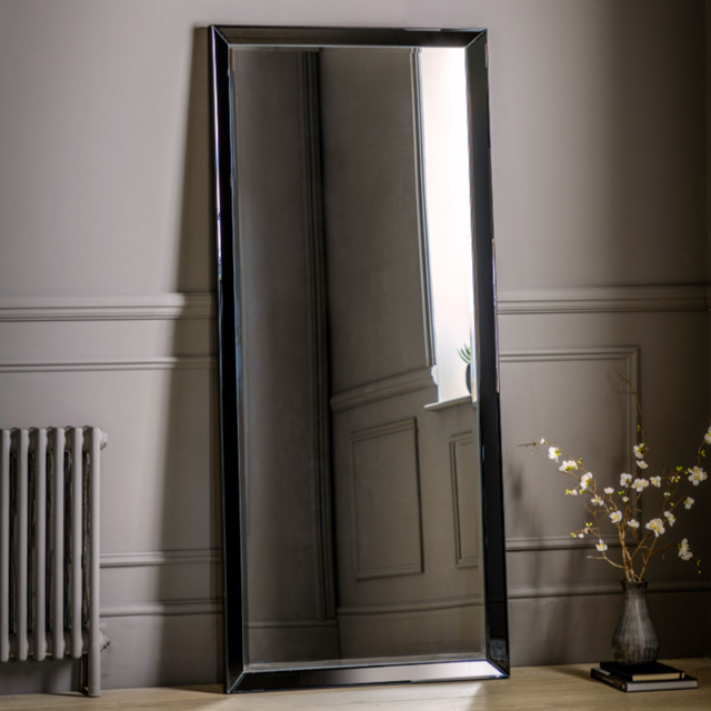The Gallery Luna Large Mirror in Black features bevelled glass, angled frame, large versatile hanging or leaning options