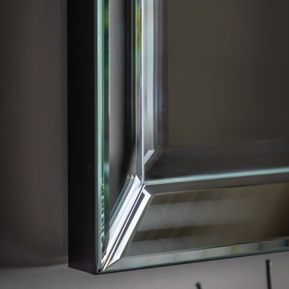 The Gallery Luna Overmantle Mirror in Silver features bevelled panels, sleek silver edge and versatile hanging options.