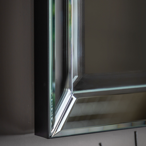 The Gallery Luna Overmantle Mirror in Silver features bevelled panels, sleek silver edge and versatile hanging options.