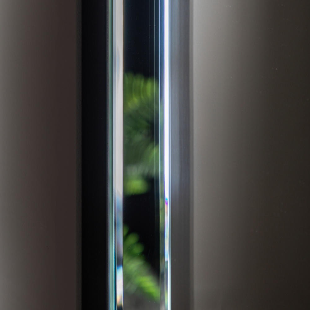The Gallery Luna Overmantle Mirror in Silver features bevelled panels, sleek silver edge and versatile hanging options.