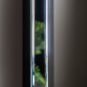 The Gallery Luna Overmantle Mirror in Silver features bevelled panels, sleek silver edge and versatile hanging options.