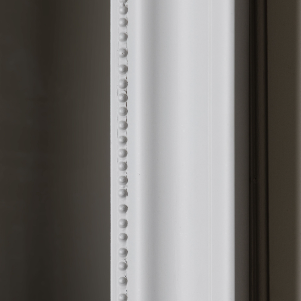 The Gallery Sherwood Large Rectangle Mirror in Stone adds light and depth with its classic frame and durable design.