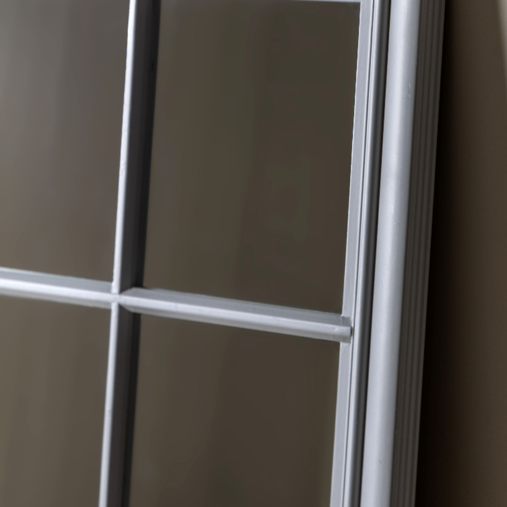 The Gallery Sherwood Window Mirror in Stone features a windowpane design, stone finish and durable build