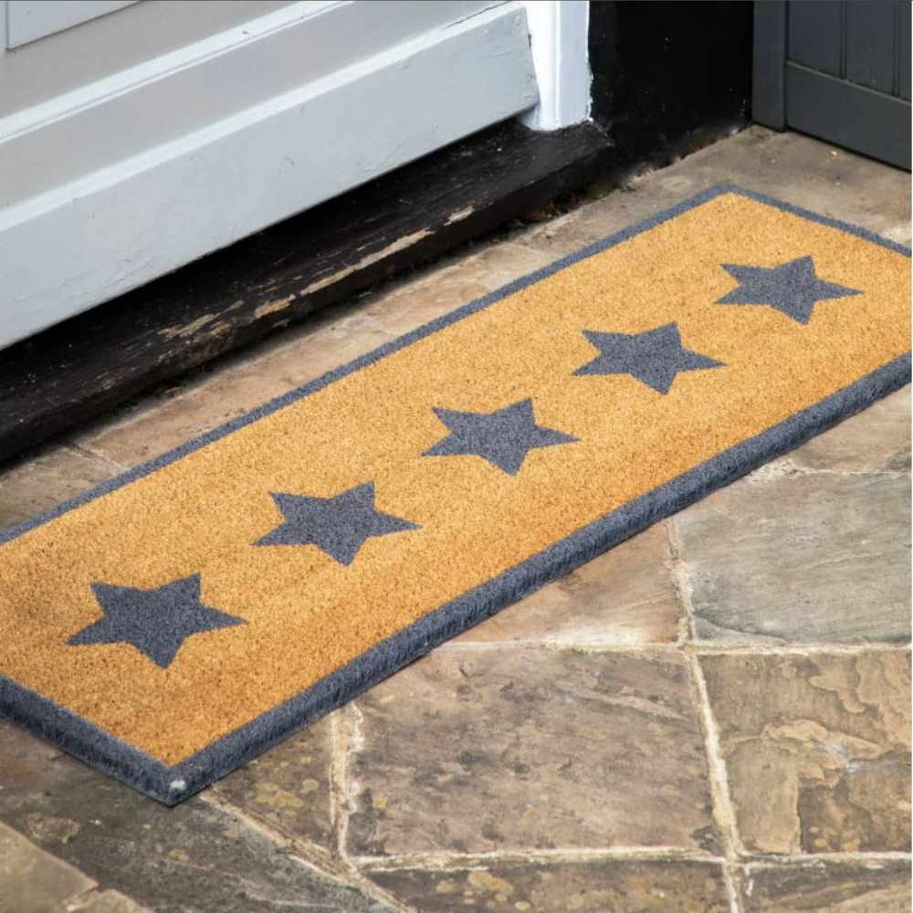 The Gallery Star Coir Double Doormat is extra-wide for double doors, durable coir traps dirt, with non-slip backing.