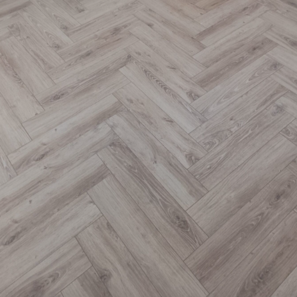The Galway Herringbone Laminate Flooring - 12mm: AC6 durable, versatile patterns, and easy installation.
