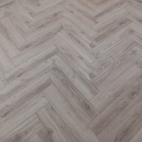 The Galway Herringbone Laminate Flooring - 12mm: AC6 durable, versatile patterns, and easy installation.