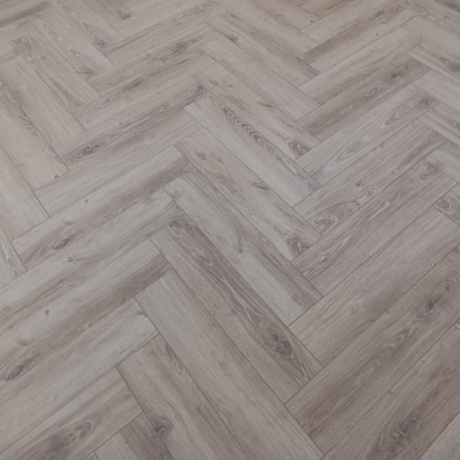 The Galway Herringbone Laminate Flooring - 12mm: AC6 durable, versatile patterns, and easy installation.