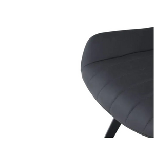 The George Faux Leather Dining Chair offers a faux leather with winged seat design, metal tapered legs and multiple colour options for modern dining spaces