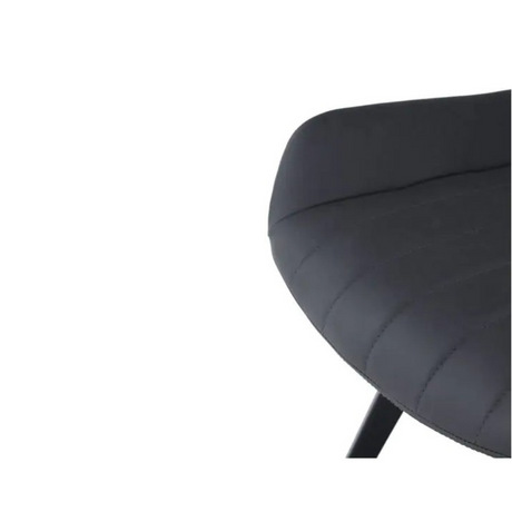 The George Faux Leather Dining Chair offers a faux leather with winged seat design, metal tapered legs and multiple colour options for modern dining spaces