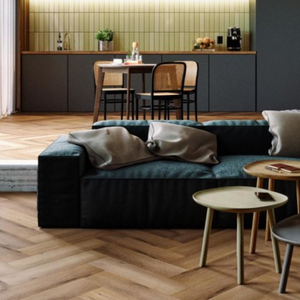 The Georgetown Oak Herringbone SPC Flooring features a timeless oak design, suitable for underfloor heating, Titanium Nano finish and a 25 year warranty