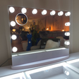 The Glamour 13 Hollywood Mirror features 3 colour lighting, Bluetooth speaker, USB port & detachable base, ideal vanity mirror for lighting and convenience