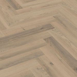 Greige Oak Herringbone Laminate Flooring 12mm: AC4-rated, durable, click-lock installation, suitable for commercial and residential spaces. Timeless herringbone design.