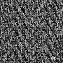 Close-up of textured grey carpet with 'Grey Door' branding.