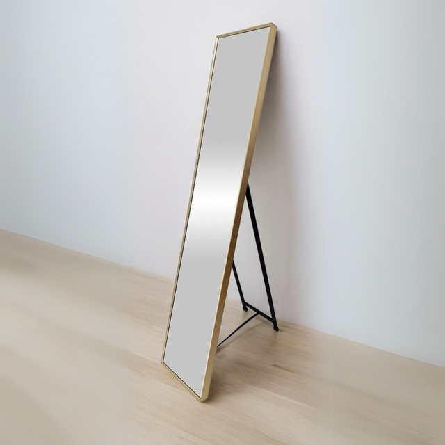 The Hamal Dressing Mirror (150.5x30.5cm) has a full-length design, a slim gold aluminium frame, and wall-mount or freestanding options.