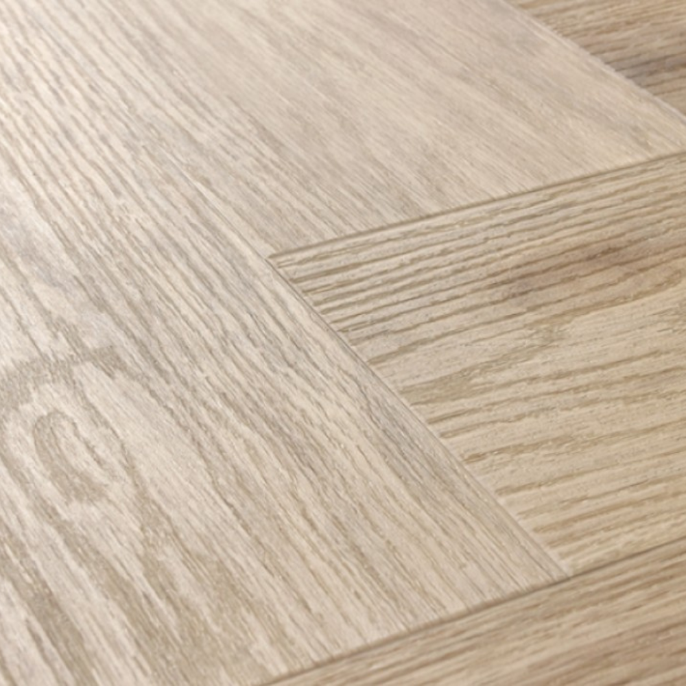 The Harlow Oak Herringbone SPC Flooring features a timeless oak design, suitable for underfloor heating, Titanium Nano finish and a 25 year warranty